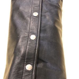 Ladies size small black leather chaps.